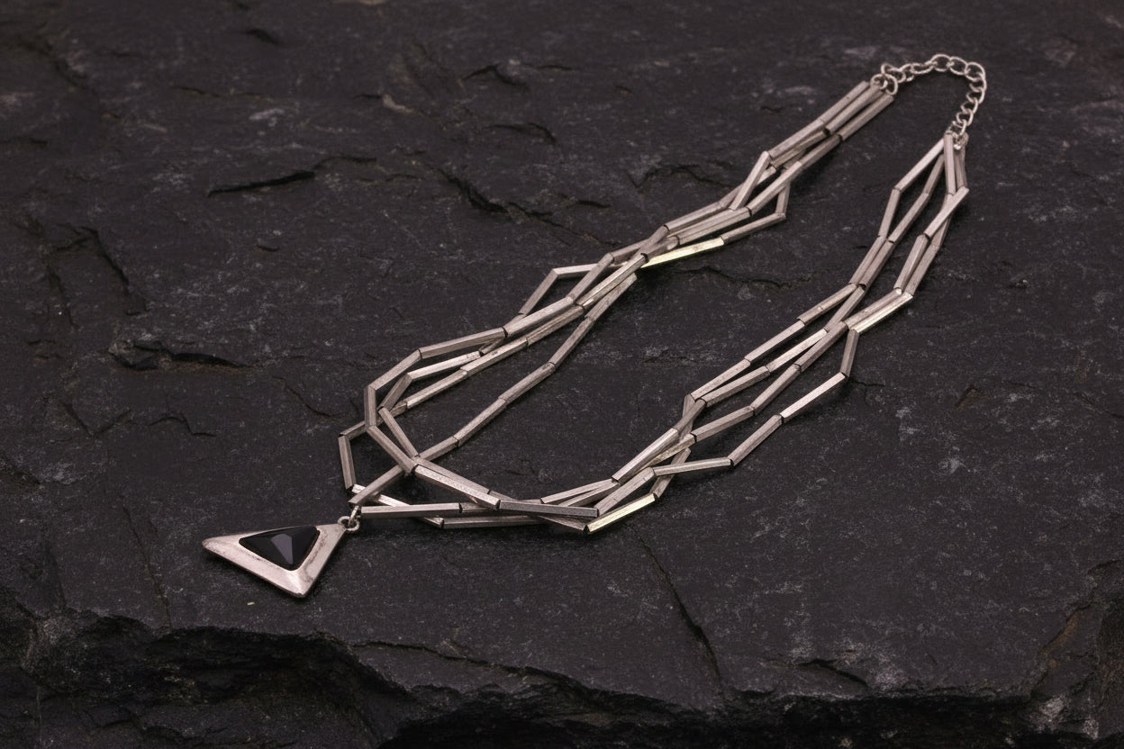 Black triangle pendant necklace