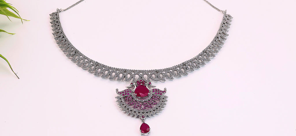 Diamond necklace set with pink stones