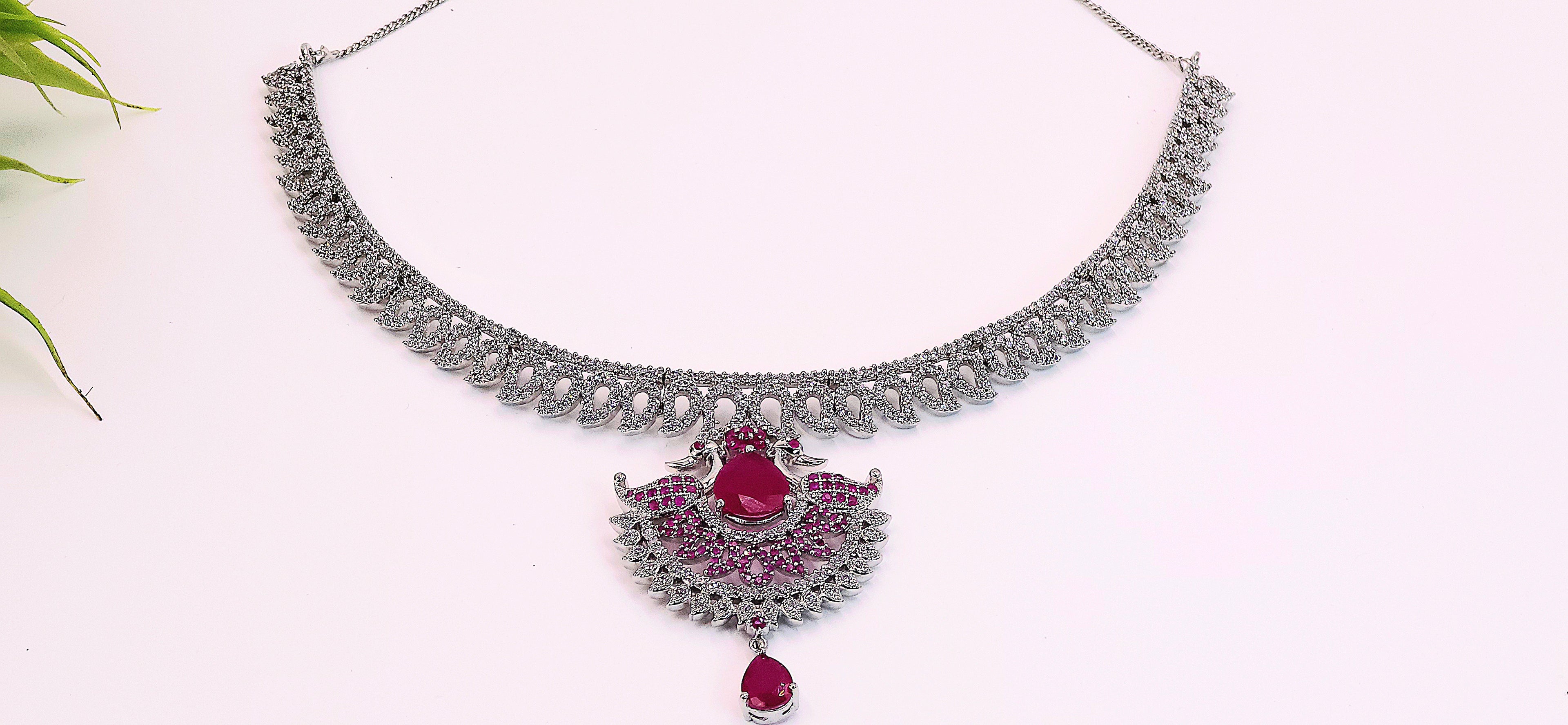 Diamond necklace set with pink stones